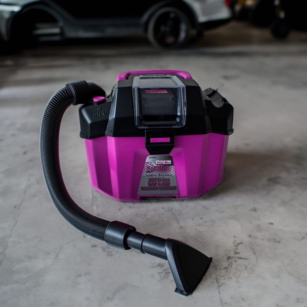 The Original Pink Box Wet Dry Vacuum in a garage